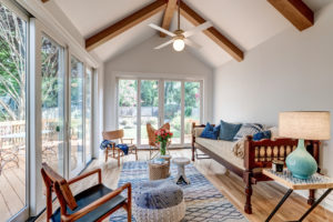 Newly built sunroom addition with vaulted ceiling and expansive windows in Washington, DC home